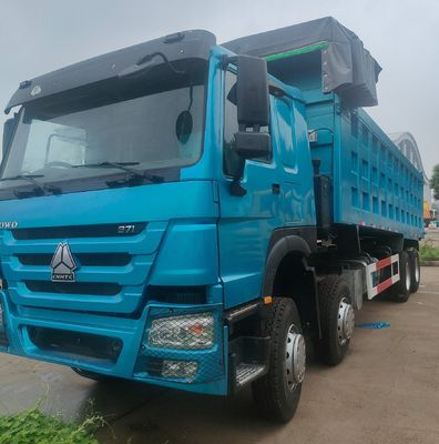 Gepersonaliseerde laadcapaciteit Zware HOWO 8X4 dumper voor bouw en vervoer