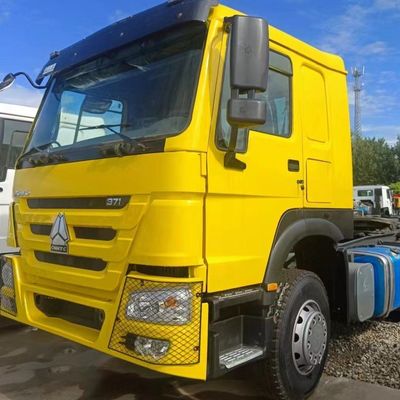 Voorste Lifting Style Sinotruk Hydraulisch stuur Zware vrachtwagen met banden